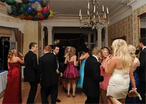 Prom guests dancing on a dance floor
